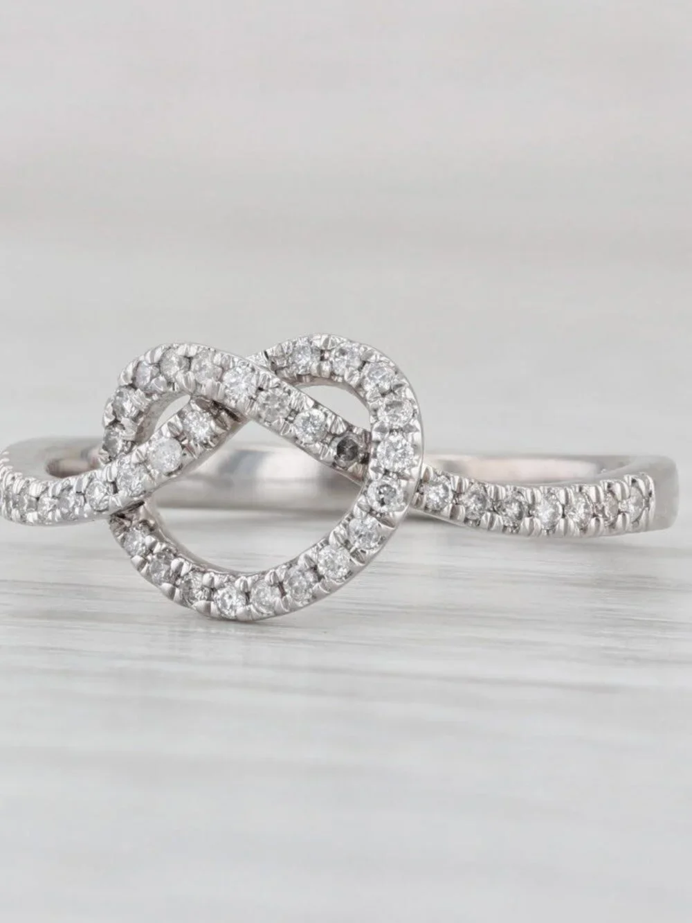 0.25ctw Diamond Preztle Knot Ring 10k White Gold Size 7.5